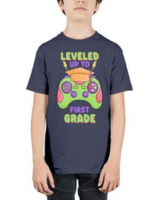 Leveled up to first Grade 467# - first grade - Youth Tee Unisex