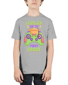 Leveled up to first Grade 467# - first grade - Youth Tee Unisex