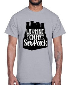 working on my six pack 1789#- beer- Cotton Tee