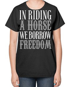 in riding a horse we borrow freedom - horse-  Ladies T-Shirt