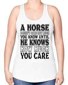 a horse doesnt care how much you know until - horse -Racerback Tank